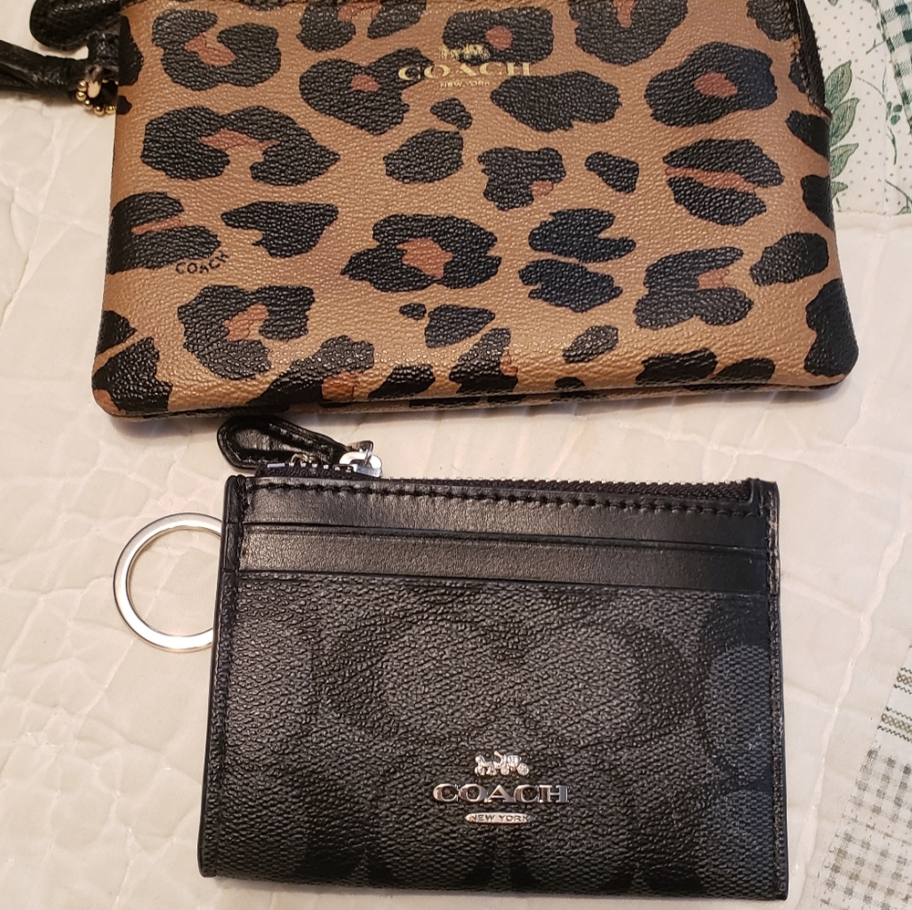 Coach card holder and wristlet wallet.
